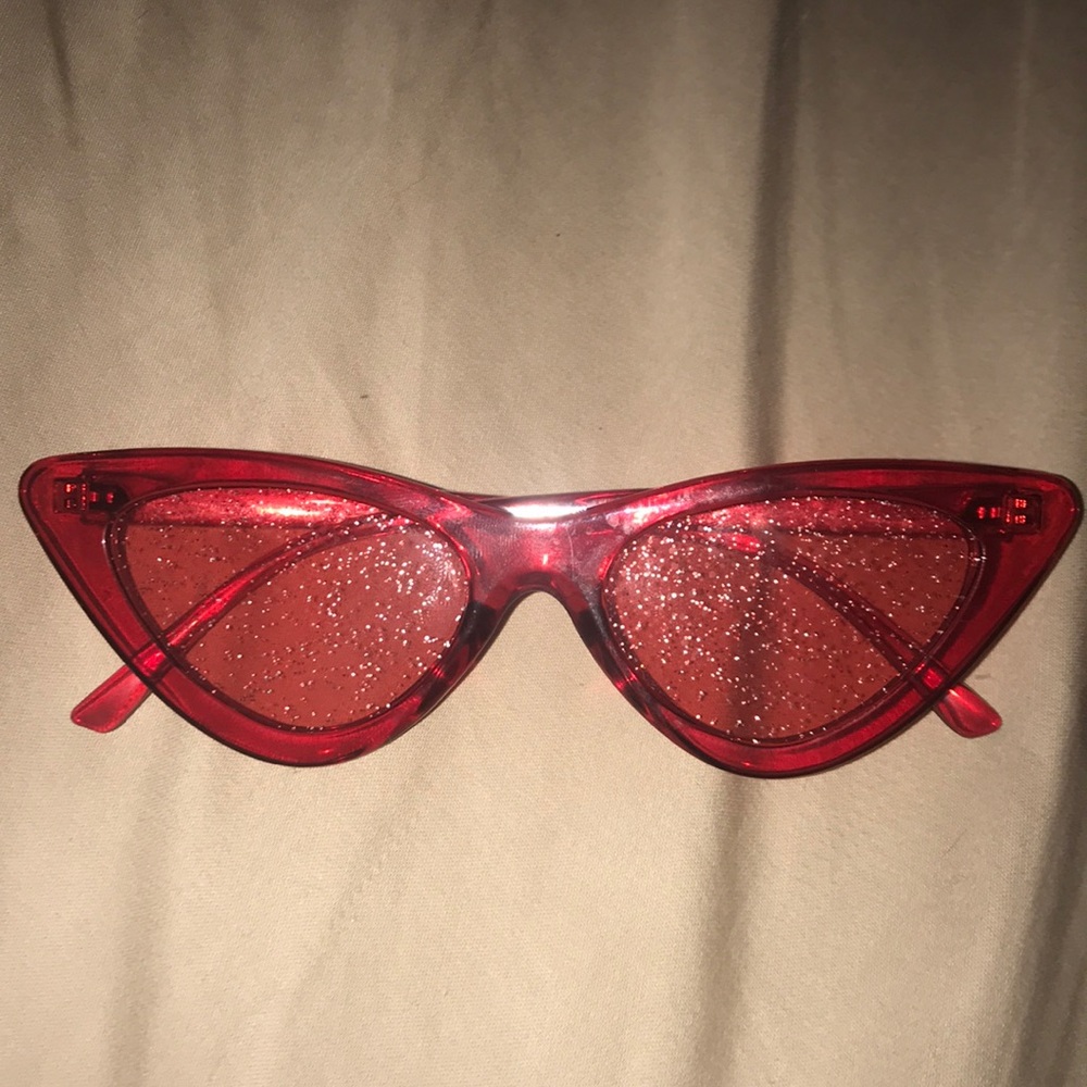 Never been worn trendy red sunnies!